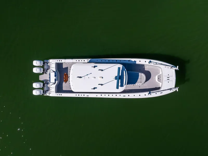 Slide: The Image of Aerial view of 2022 Freeman 43 boat on green water. - 9