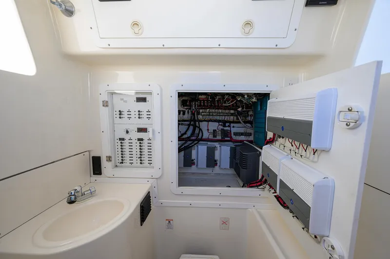 Slide: The Image of Electrical panel and sink inside 2008 SeaVee 39b boat cabin. - 28