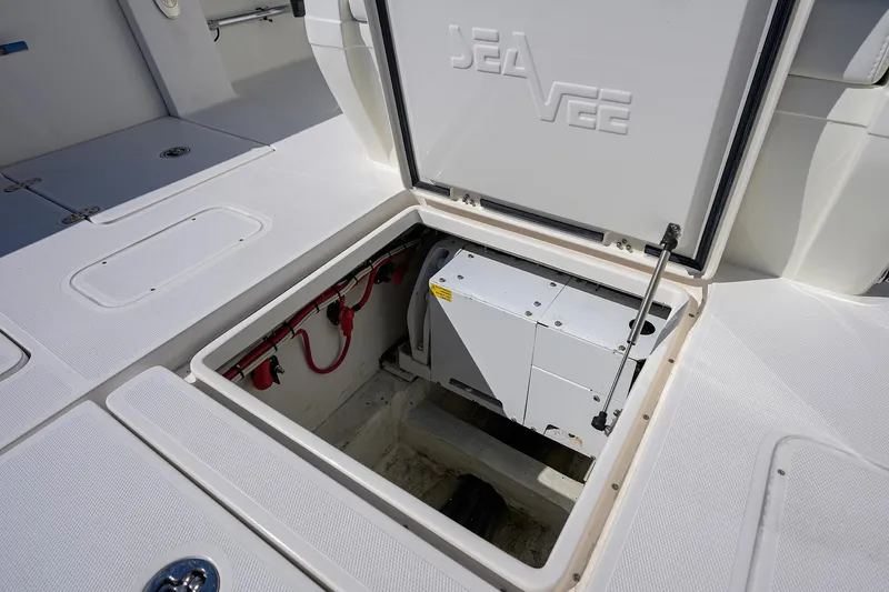 Slide: The Image of 2008 SeaVee 39b boat storage compartment with open hatch, showcasing interior equipment. - 29