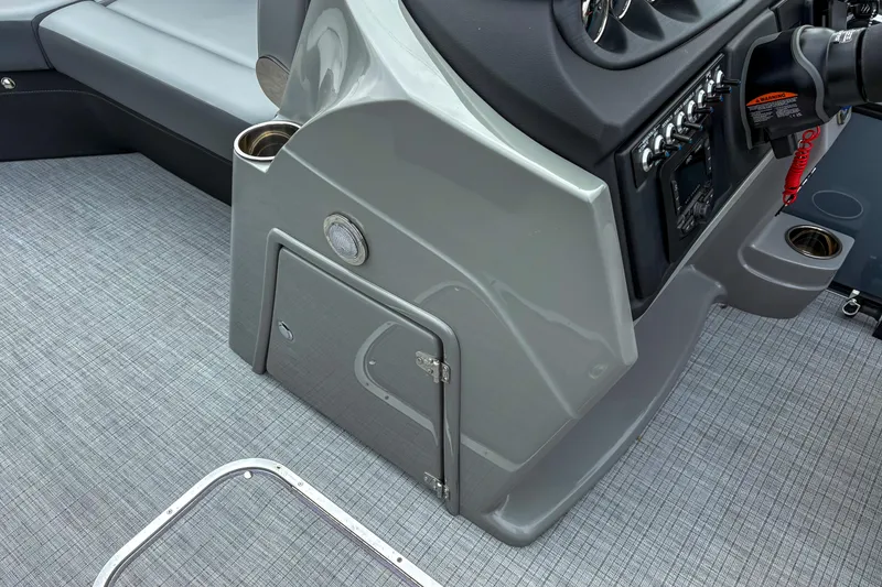 Slide: The Image of 2025 Trifecta 24 RF CS boat console with modern controls and seating. - 10