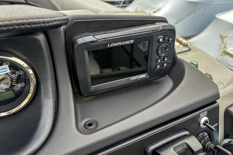 Slide: The Image of Dashboard of 2025 Trifecta 24 RF CS with Lowrance Hook fishfinder. - 12