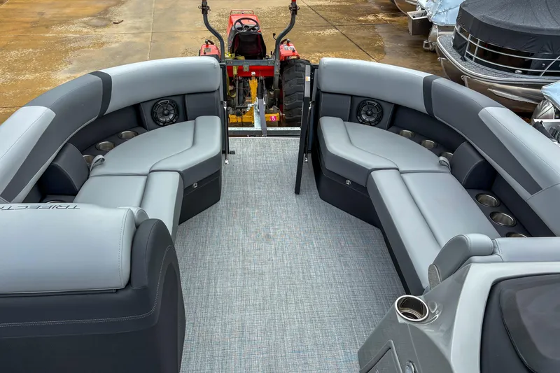 Slide: The Image of Luxurious seating on 2025 Trifecta 24 RF CS pontoon boat, featuring modern design and comfort. - 9