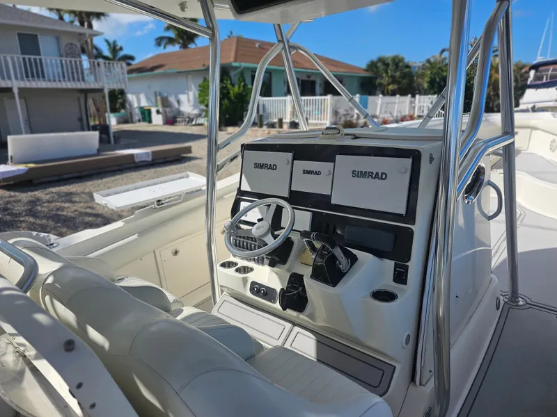 Slide: The Image of 2006 Hydra-Sports Vector 3300 CC boat cockpit with Simrad navigation system. - 4
