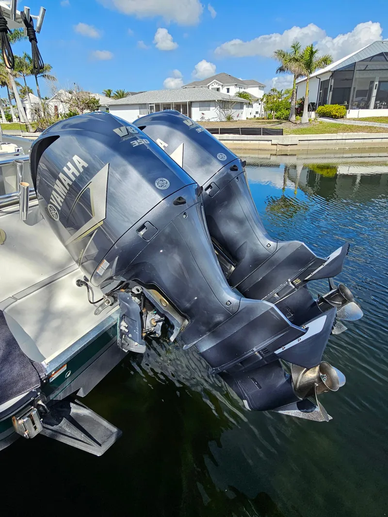 Slide: The Image of 2006 Hydra-Sports Vector 3300 CC with twin Yamaha outboard motors on a sunny day. - 5