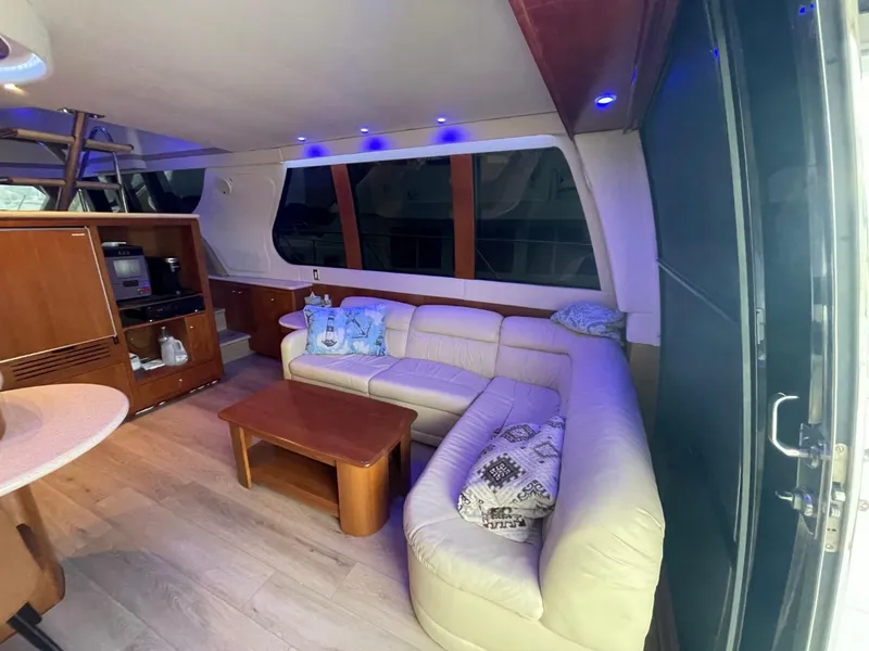 Slide: The Image of Luxurious interior of 1998 Carver 530 Voyager Pilothouse with leather seating and modern amenities. - 35