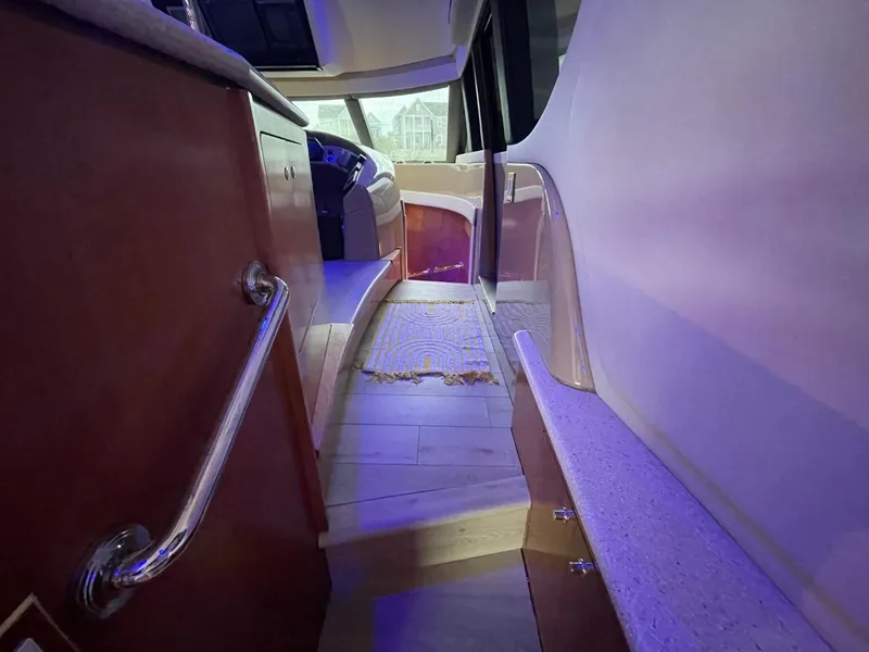 Slide: The Image of Interior of 1998 Carver 530 Voyager Pilothouse with wood accents and modern design. - 41