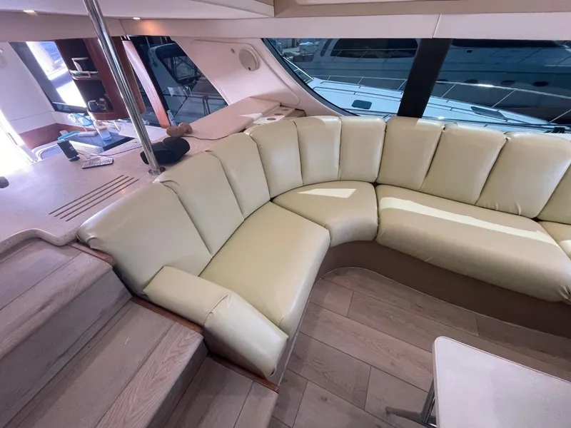 Slide: The Image of Luxurious interior of 1998 Carver 530 Voyager Pilothouse with cream leather seating. - 49