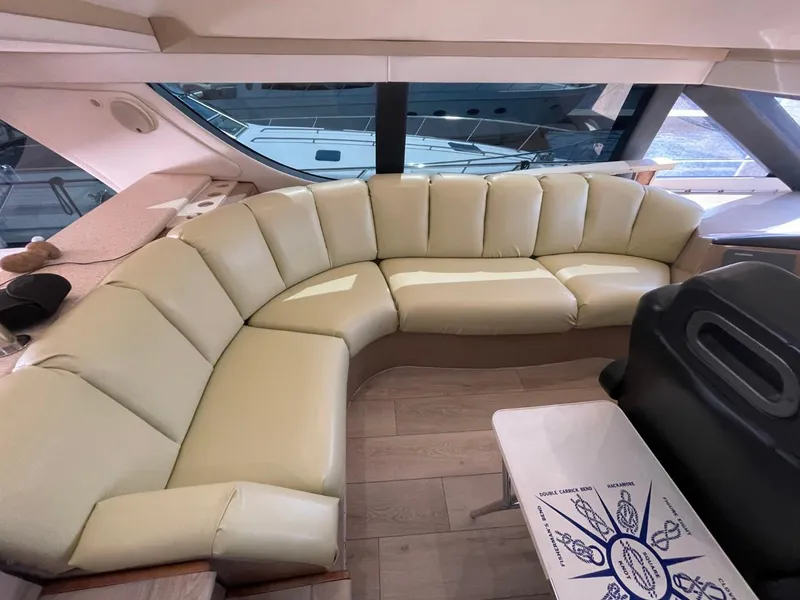 Slide: The Image of Luxurious interior of 1998 Carver 530 Voyager Pilothouse with cream leather seating. - 47