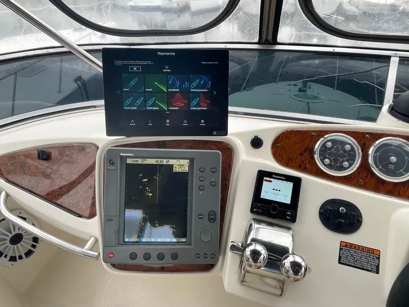Slide: The Image of Helm of 2004 Meridian 459 Motoryacht with navigation and control systems. - 11