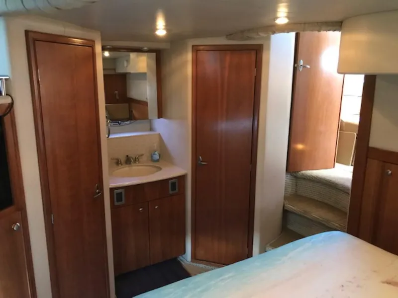 Slide: The Image of Interior of 2004 Meridian 459 Motoryacht with wood cabinetry and compact bathroom. - 34