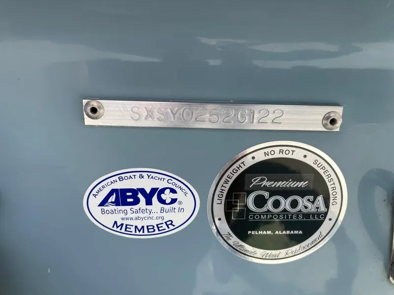 Slide: The Image of 2022 Sea Hunt 234 Ultra boat with ABYC and Coosa Composites labels. - 48