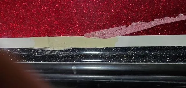 Slide: The Image of Close-up of damaged paint on 2001 Bass Tracker TARGA 1900 fiberglass boat. - 10
