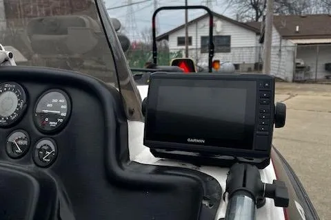 Slide: The Image of 2001 Bass Tracker TARGA 1900 boat dashboard with Garmin GPS device. - 13