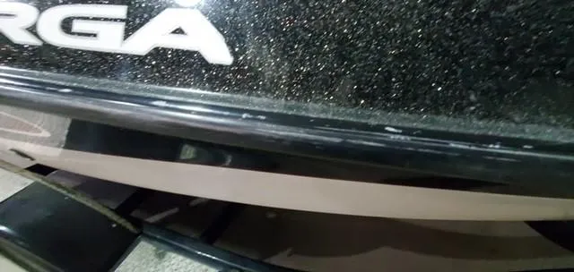 Slide: The Image of 2001 Bass Tracker TARGA 1900 Fiberglass Walleye Boat, close-up of hull detail. - 5