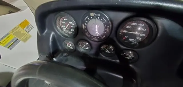 Slide: The Image of Dashboard of a 2001 Bass Tracker TARGA 1900 Fiberglass Walleye Boat with gauges. - 8