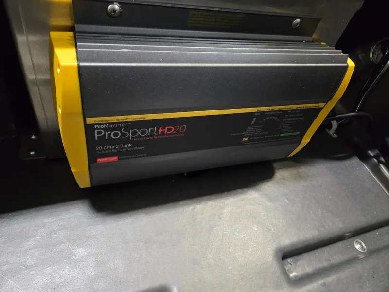 Slide: The Image of Battery charger in a 2025 Princecraft Sportfisher 21-2RS boat. - 11