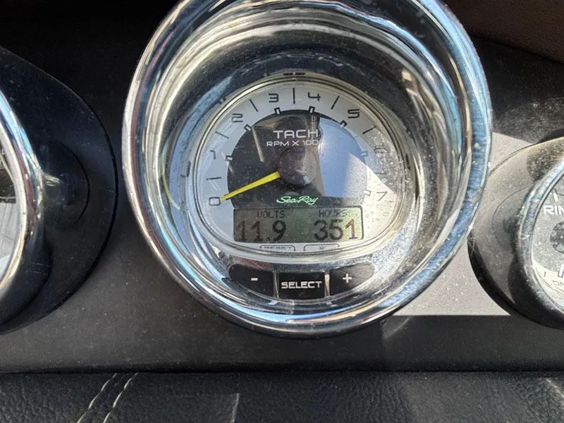 Slide: The Image of Tachometer of 2013 Sea Ray 250 SLX showing RPM and engine hours. - 15