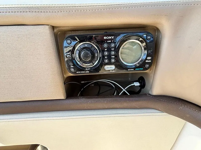 Slide: The Image of Sony stereo system on 2013 Sea Ray 250 SLX boat dashboard. - 20