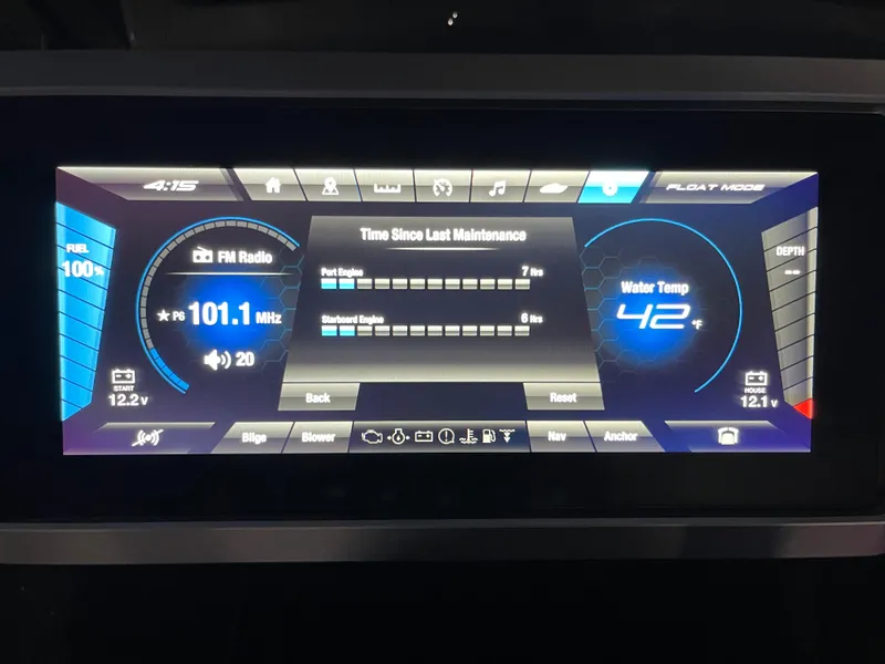 Slide: The Image of Yamaha Boats 2021 252SE dashboard display showing FM radio and water temperature. - 16