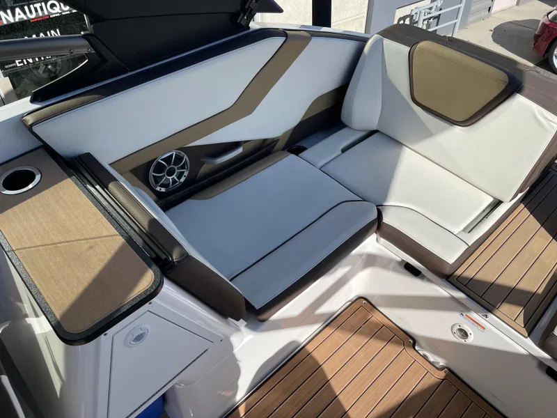 Slide: The Image of 2021 Yamaha Boats 252SE interior with stylish seating and modern design. - 5