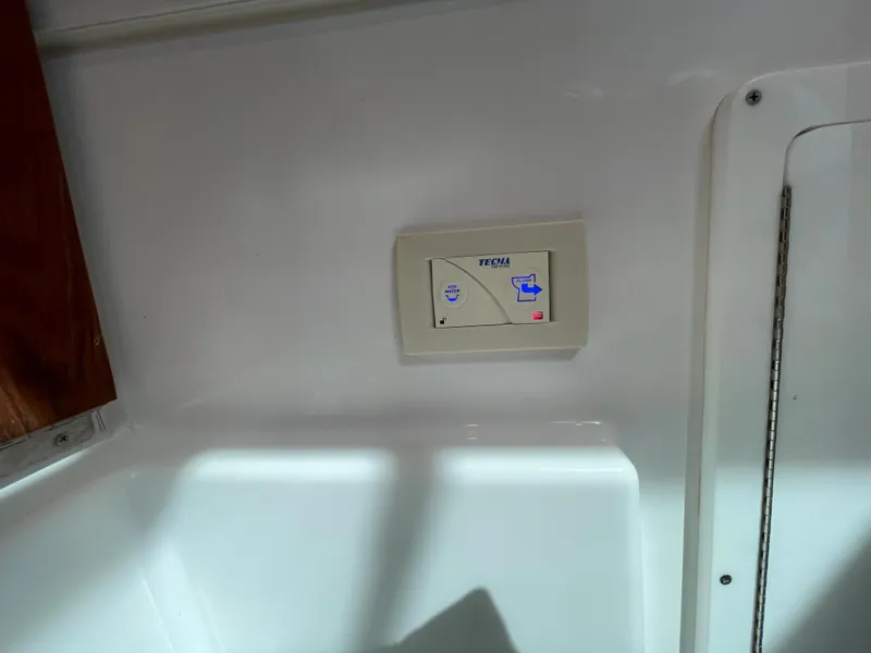 Slide: The Image of Control panel on 2022 Bertram 39 CC boat interior wall. - 46