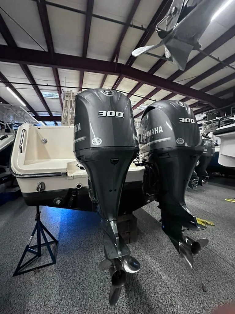 Slide: The Image of 2018 Grady-White Marlin 300 with twin Yamaha 300 engines in a showroom. - 3