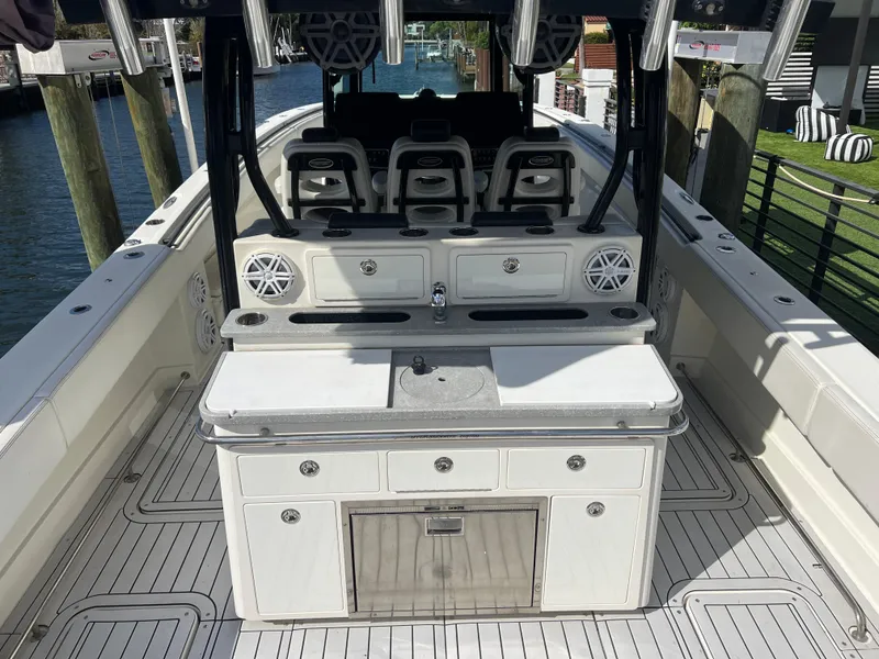 Slide: The Image of 2017 Hydra-Sports 4200 Siesta boat interior with seating and storage. - 10