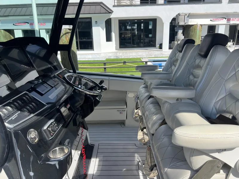 Slide: The Image of Interior of 2017 Hydra-Sports 4200 Siesta boat with luxurious seating and modern dashboard. - 7