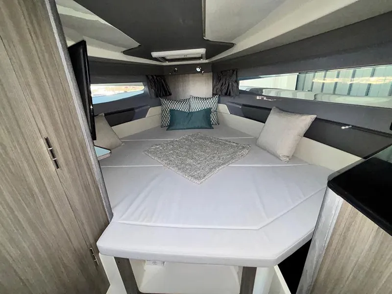 Slide: The Image of Luxurious interior of 2025 Navan C30 boat with cozy bedding and modern design. - 31