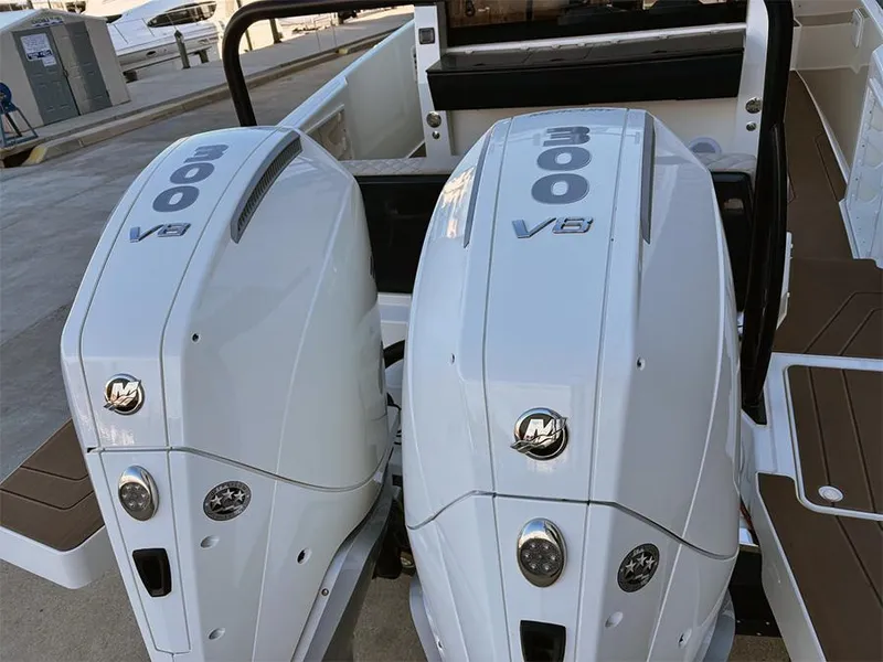 Slide: The Image of Twin 300 V8 outboard engines on a 2025 Navan C30 boat. - 4