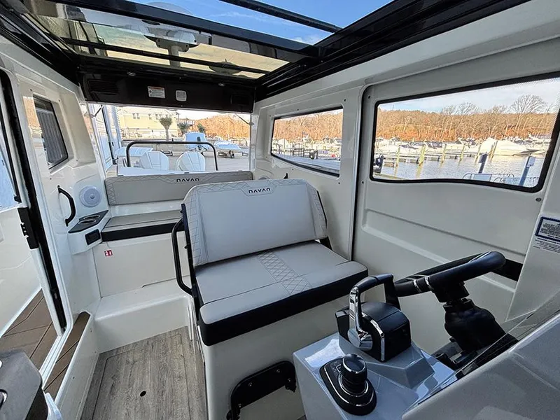 Slide: The Image of Interior of 2025 Navan C30 boat with modern seating and control panel. - 40