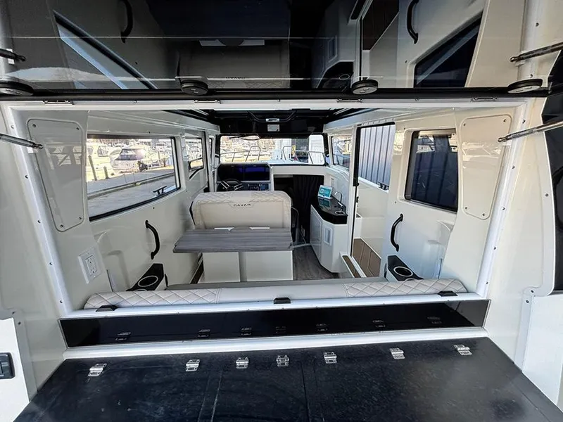 Slide: The Image of Interior view of 2025 Navan C30 boat, featuring modern seating and sleek design elements. - 9