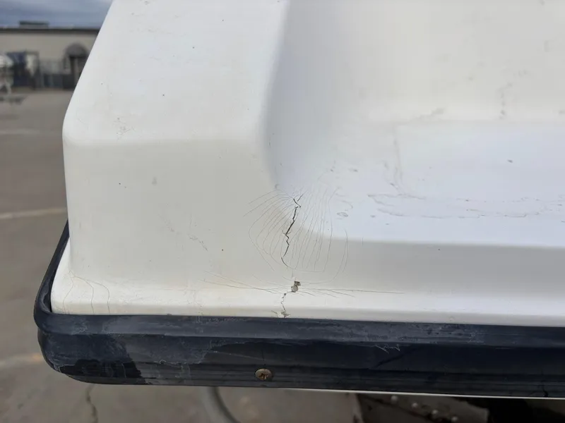 Slide: The Image of Cracked corner of a 1997 Jefferson Marlago 35 FS boat hull. - 14