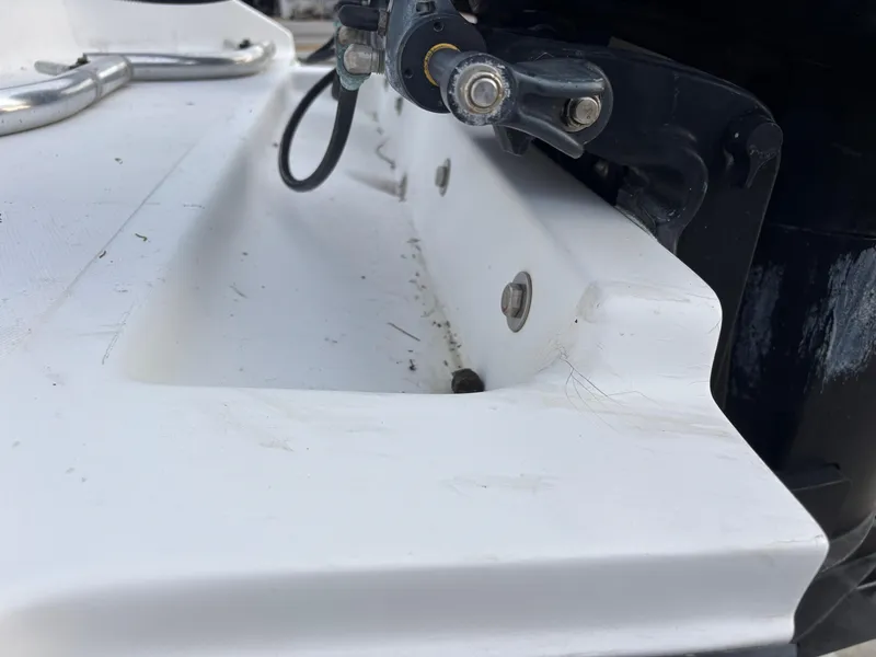 Slide: The Image of Close-up of a 1997 Jefferson Marlago 35 FS boat's white deck and hardware. - 15