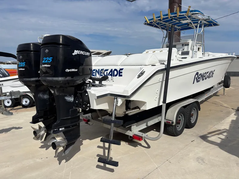 Slide: The Image of 1997 Jefferson Marlago 35 FS boat with twin Mercury 225 Optimax engines on a trailer. - 2