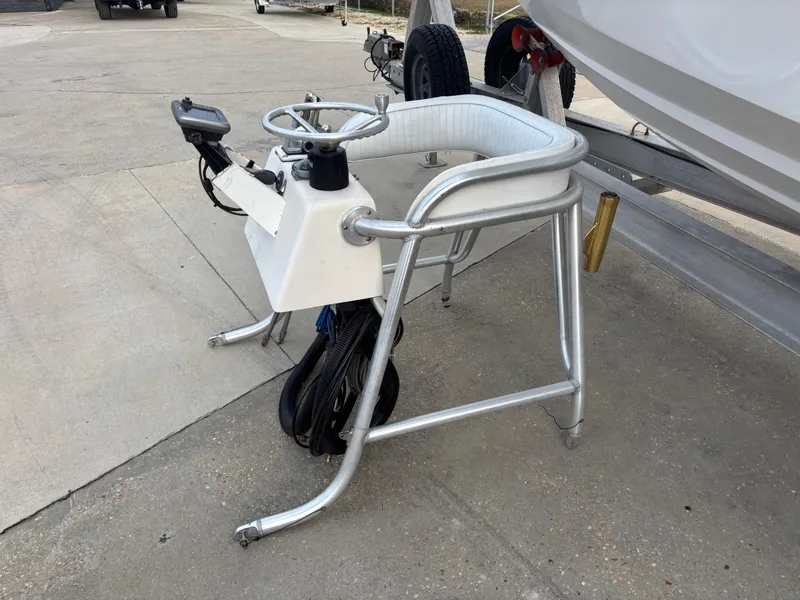 Slide: The Image of Boat steering console from a 1997 Jefferson Marlago 35 FS on a trailer. - 21