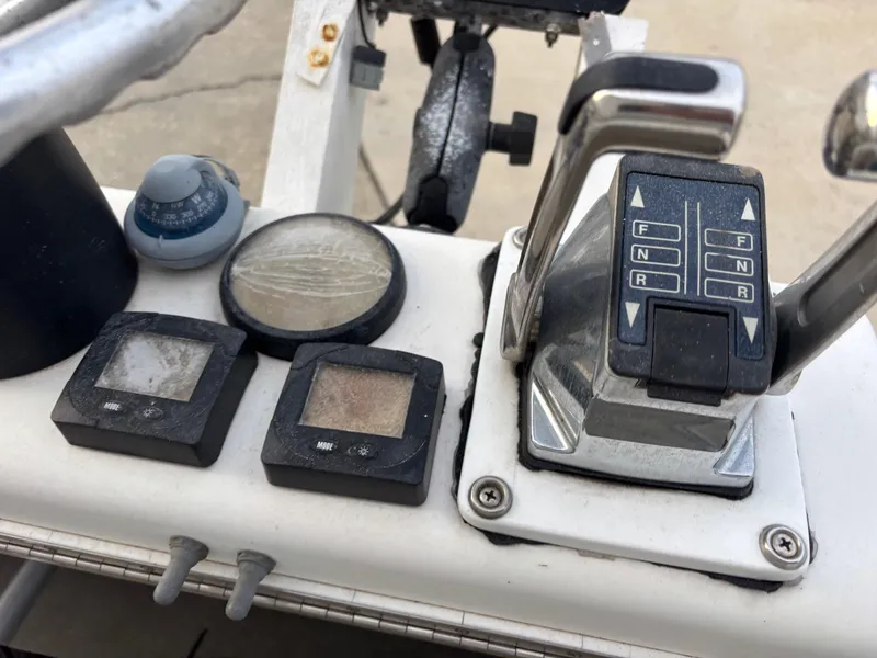 Slide: The Image of Control panel of a 1997 Jefferson Marlago 35 FS boat with navigation instruments. - 25