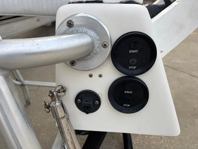 Slide: The Image of Control panel of a 1997 Jefferson Marlago 35 FS boat with start and stop buttons. - 27