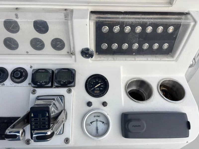 Slide: The Image of Control panel of a 1997 Jefferson Marlago 35 FS boat with gauges and switches. - 40
