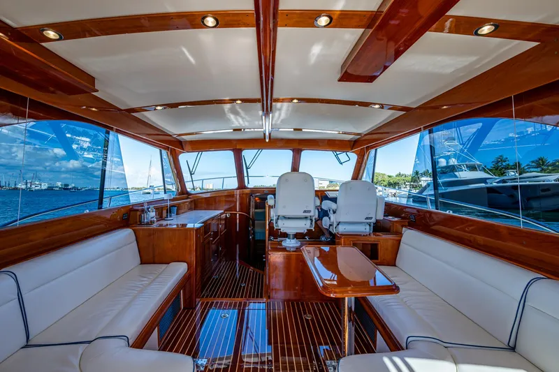 Slide: The Image of Luxurious interior of 2019 Hinckley Talaria 43 Flybridge yacht with elegant wood finishes. - 26