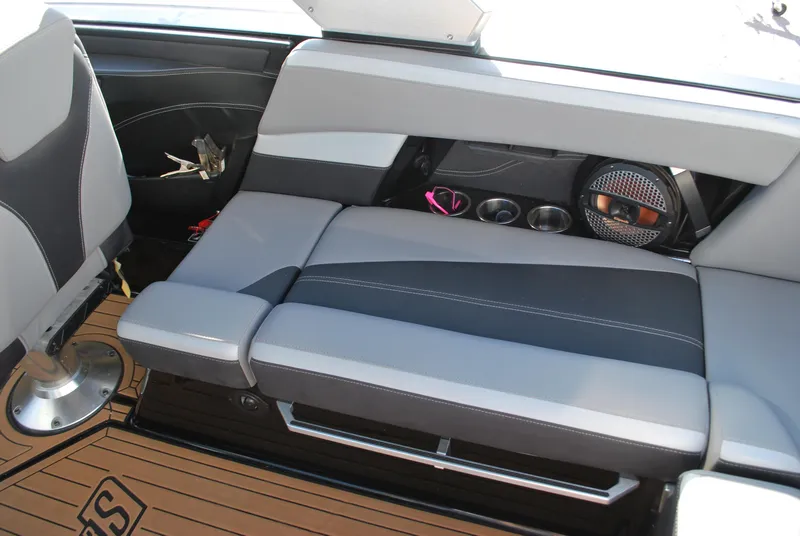 Slide: The Image of 2023 MasterCraft XStar S interior with sleek seating and modern design. - 11
