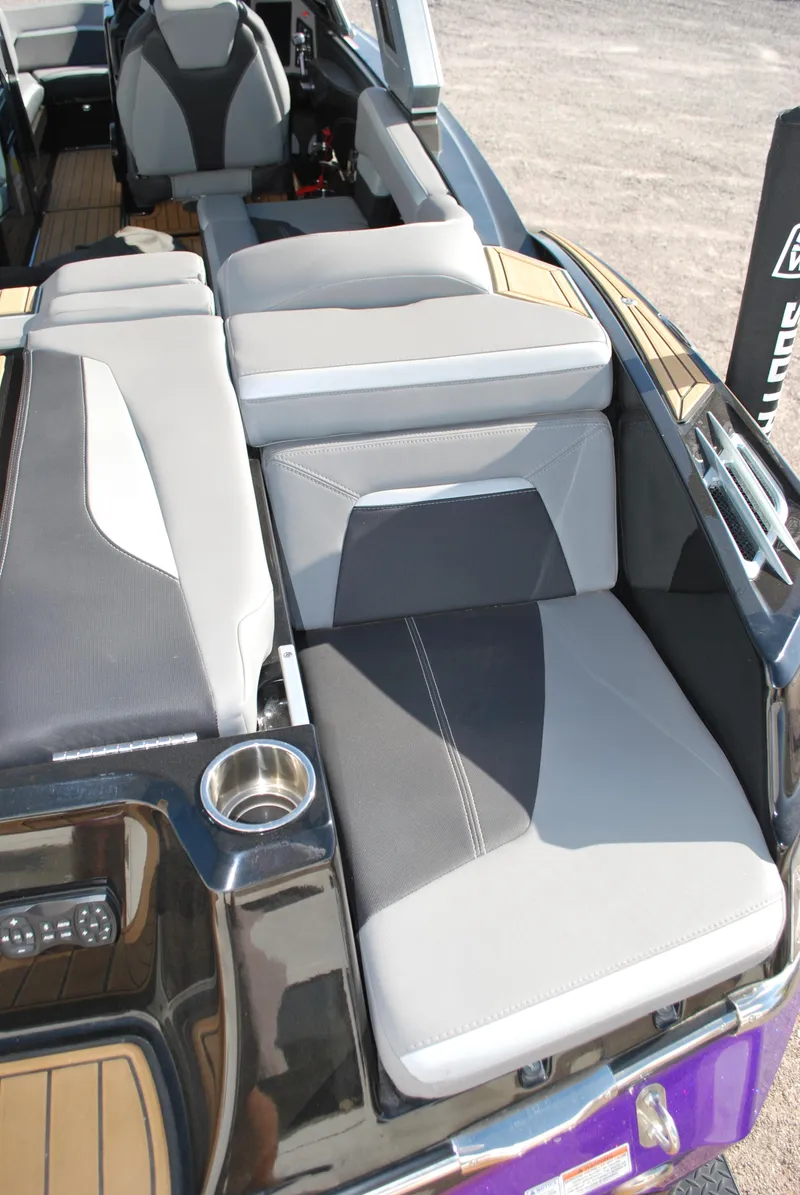 Slide: The Image of 2023 MasterCraft XStar S boat interior with sleek, modern seating design. - 15
