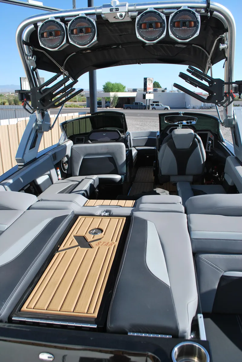 Slide: The Image of 2023 MasterCraft XStar S interior with luxury seating and advanced audio system. - 17