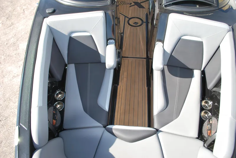 Slide: The Image of 2023 MasterCraft XStar S interior with sleek seating and modern design. - 5