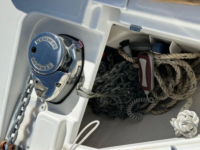 Slide: The Image of Anchor locker of 2021 Jeanneau NC 1095 Fly with ropes and chains. - 31