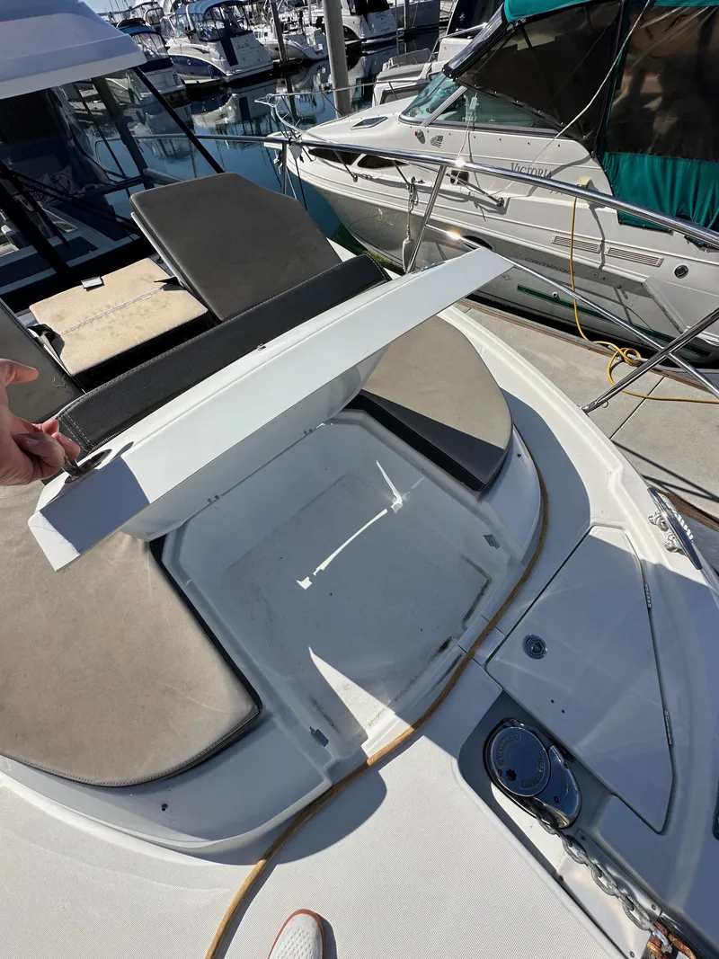 Slide: The Image of 2021 Jeanneau NC 1095 Fly boat deck with seating and storage area. - 33