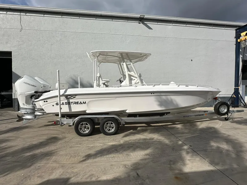 The Image of 2025 Glasstream 28 Pro boat on trailer, parked outdoors. - 1