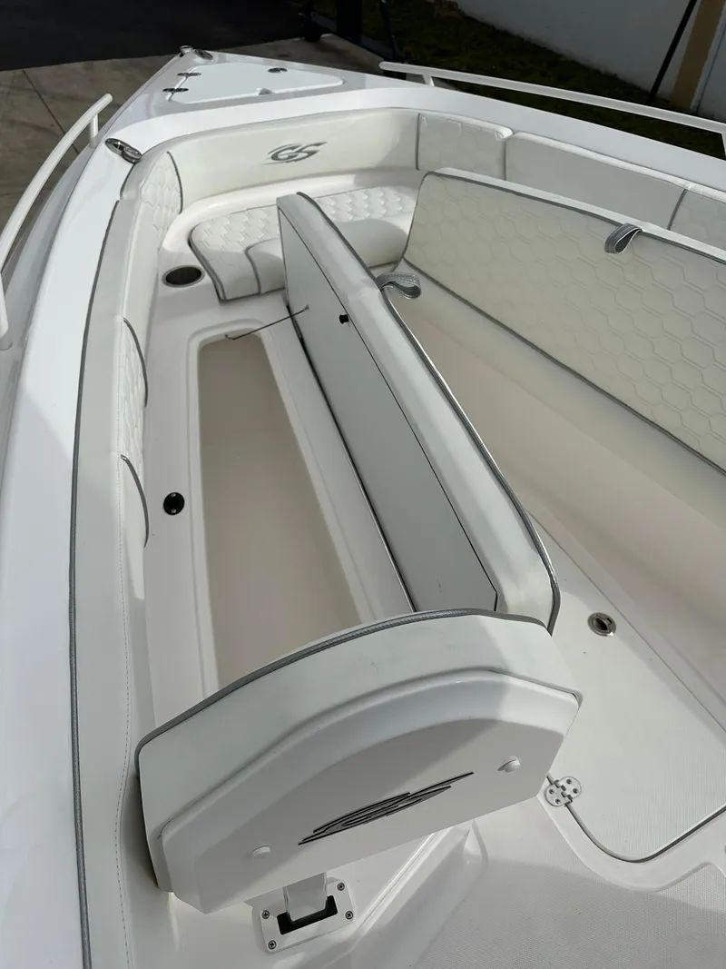 Slide: The Image of 2025 Glasstream 28 Pro boat interior with white seating and sleek design. - 14