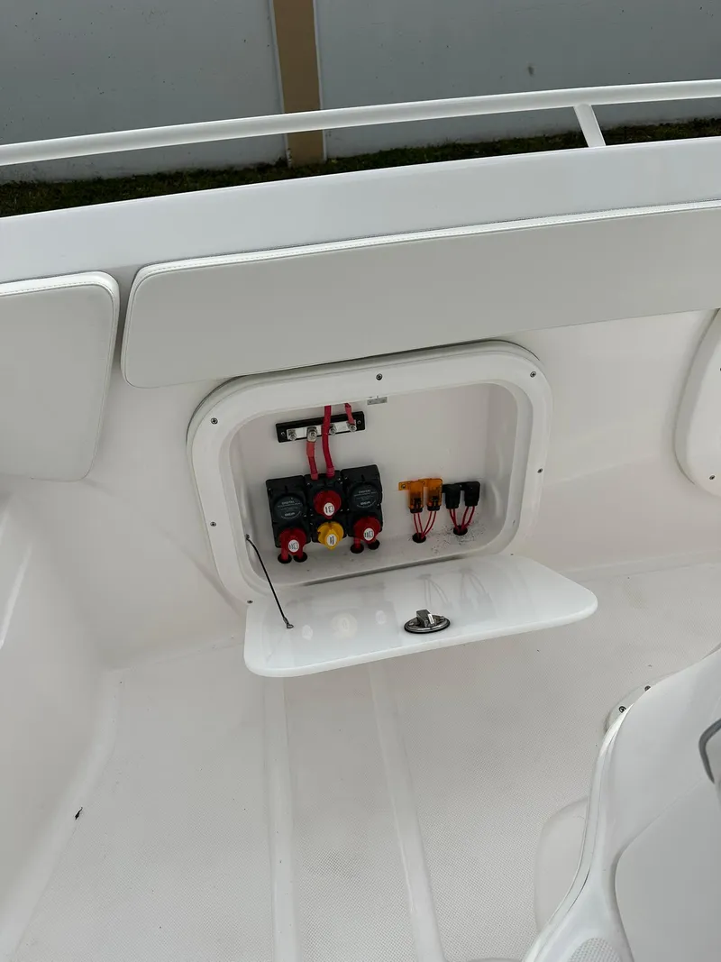 Slide: The Image of 2025 Glasstream 28 Pro boat electrical panel with switches and wiring. - 15