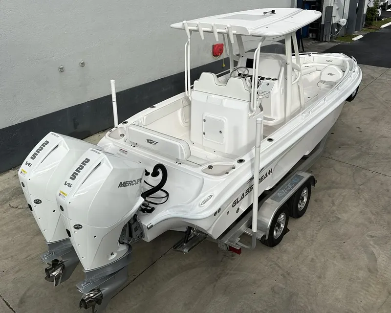 Slide: The Image of 2025 Glasstream 28 Pro boat with dual Mercury engines on a trailer. - 3